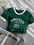 Playera corta verde con blanco con estampado de HAWAII BEACH enfrente