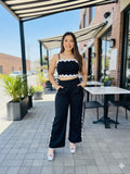 Conjunto de top estampado con lineas z y pantalon negro