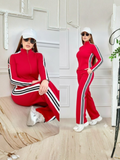 Conjunto deportivo con lineas a los lados color rojo