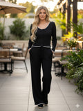 Conjunto tejido con detalle en borde blanco y pantalon color negro