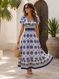 Vestido con estampado floral y elastico en cintura manga mariposa azul