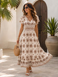 Vestido con estampado floral y elastico en cintura manga mariposa beige