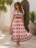 Vestido con estampado floral y elastico en cintura manga mariposa vino