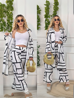 Conjunto de camisa larga con abertura y pantalon con estampado de figuras Blanco