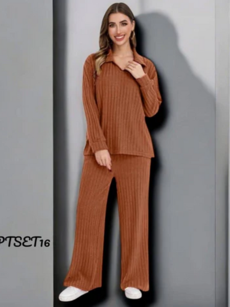 Conjunto tejido de lineas sueter cuello V y pantalon de campana naranja