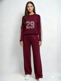 Conjunto tejido con lineas en hombro y numero 99 color vino