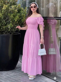 Vestido con elastico en cintura y listones en manga rosa