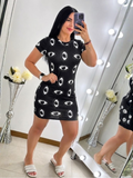 Vestido corto con estampado de ojos negro