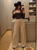 Pantalon de lino de campana con elastico color beige