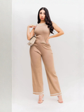 Conjunto de blusa y pantalon tejido con lineas blancas beige