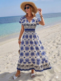 Vestido con estampado floral y elastico en cintura manga mariposa azul