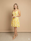 Vestido con escote en espalda corte A con estampado floral amarillo