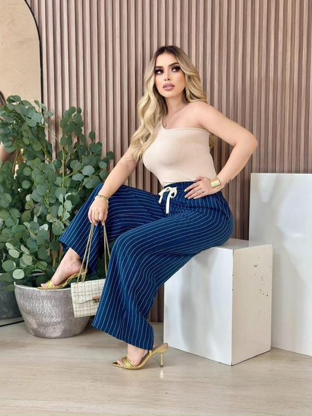Pantalon de campana con lineas blancas azul marino