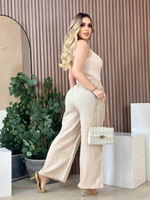 Pantalon de campana con lineas blancas beige