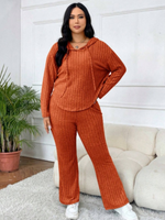 Conjunto tejido de lineas sueter con gorro y pantalon de campana naranja