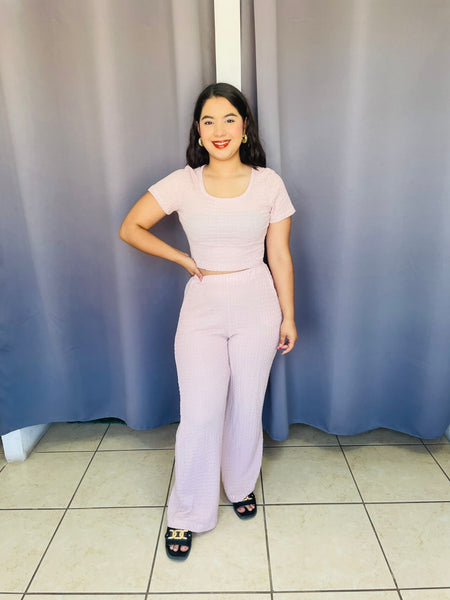 Conjunto de pantalon y blusa con manga color rosa